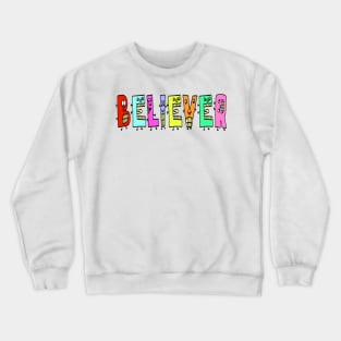 Cute Believer Motivational Text Illustrated Dancing Letters, Blue, Green, Pink for all people, who enjoy Creativity and are on the way to change their life. Are you Confident for Change? To inspire yourself and make an Impact. Crewneck Sweatshirt